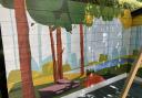 Steve Ellis's mural behind the play area at Croydon Reading Room