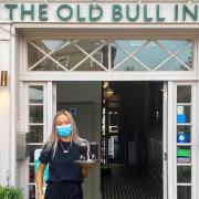 Team member Shannon from The Old Bull Inn in Royston ready to welcome back customers.