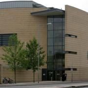 A Royston father who punched his baby boy was sentenced at Cambridge Crown Court