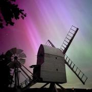 The aurora borealis in the sky over Great Chishill Windmill