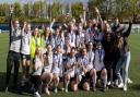 Royston Town's players and staff celebrate winning the Herts Women's Senior Cup. Picture: RTFC