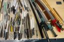 More than 50 weapons including swords, knuckle dusters and batons handed into Cambridgeshire police as part of an amnesty.