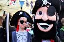 Philip Naylon with his new pal at last year's Royston's Pirate Day. Picture: Clive Porter