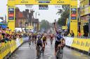 Lisa Brennauer celebrates her Stage 4 win of the Aviva Women's Tour after crossing the finish line in Stevenage.