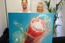 Sarah Graham and Ricky Wilson from British band Kaiser Chiefs with Sarah's painting