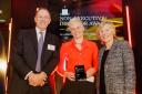 Barbara Anderson accepting her recent non-executive director award from Simon Gorringe, head of Santander, and Ruth Cairnie, chair of the NED Awards