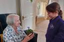 Pupils presented spring flowers to residents at Margaret House Care Home in Barley