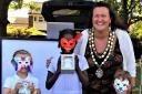 Mayor of Royston Cllr Lisa Adams judging the mask competition
