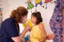 Almost 500 children have been waiting more than 18 months to be seen by a community paediatrician.