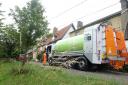 An electric bin lorry in Cambridgeshire