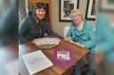 (L-R) Tracy Aggett, Home-Start fundraising events support manager, with Eileen, one of Melbourn Springs Care Home residents, and the money they raised