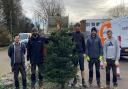 Volunteers and settle employees collected and shredded more than 1,000 Christmas trees in exchange for a donation to Garden House Hospice Care
