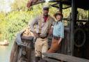 Dwayne Johnson as Frank and Emily Blunt as Lily in Jungle Cruise.