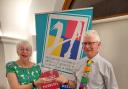 Jane and Mike Dottridge, from Royston & District Twinning Association, receiving a trophy for 'twin town of the year'