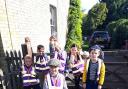 Children from Therfield First School delivered biscuits around the village to celebrate the harvest