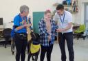 Evie Evans learnt to walk again with the help of labradoodle Poppy