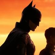 Robert Pattinson as Batman and Zoë Kravitz as Selina Kyle in Warner Bros. Pictures’ The Batman.