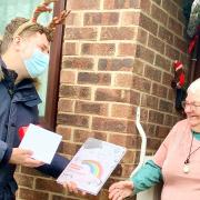 Dan Amis from Melbourn Springs Care Home presented Elizabeth 'Betty' Murphy with her winning poem