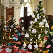 Mordens Scout Group decorated trees for the Christmas tree festival at St Peter and St Paul in Steeple Morden