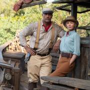 Dwayne Johnson as Frank and Emily Blunt as Lily in Jungle Cruise.