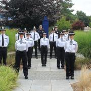 Cambridgeshire's 19 new police officers are pictured at their passing out ceremony