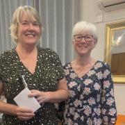Spring Meeting winner Liz Slaughter (left) with lady captain Sue Bidwell. Picture: ROYSTON GC