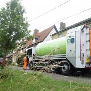 An electric bin lorry in Cambridgeshire
