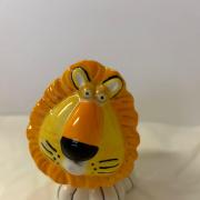 A pottery lion made by Glazed Creations