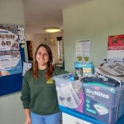 A staff member at Shepreth Hedgehog Hospital with the donations