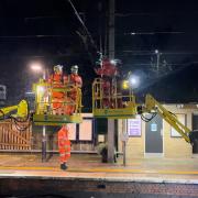 Network Rail engineers working on the overhead line equipment at Royston