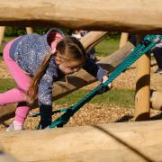 Trying out the new play equipment at Wimpole Estate
