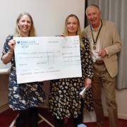 Rotary president Phillip Martin presented the cheque to Bethan and Kirsten from Angels Support