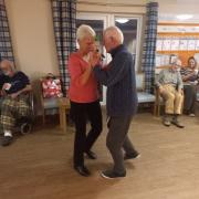 Resident John taught others how to dance a waltz