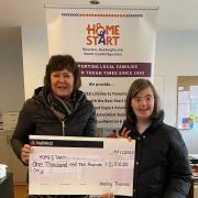 Keeley Thomas presented a cheque to Tracy Aggett from Home-Start Royston, Buntingford and South Cambs