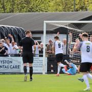 Kian Harness runs away after scoring for Royston against Kettering. Picture: PETER SHORT