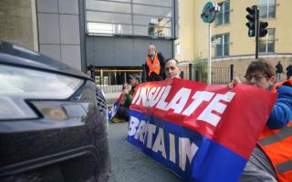 An Insulate Britain protest in Canary Wharf, London (October 2021)